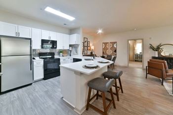 Gourmet kitchens with breakfast room or breakfast bar and custom cherry cabinetry